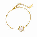 Gold bracelet with flower design in 18K gold plating, featuring adjustable chain and waterproof, tarnish-free finish for lasting wear.
