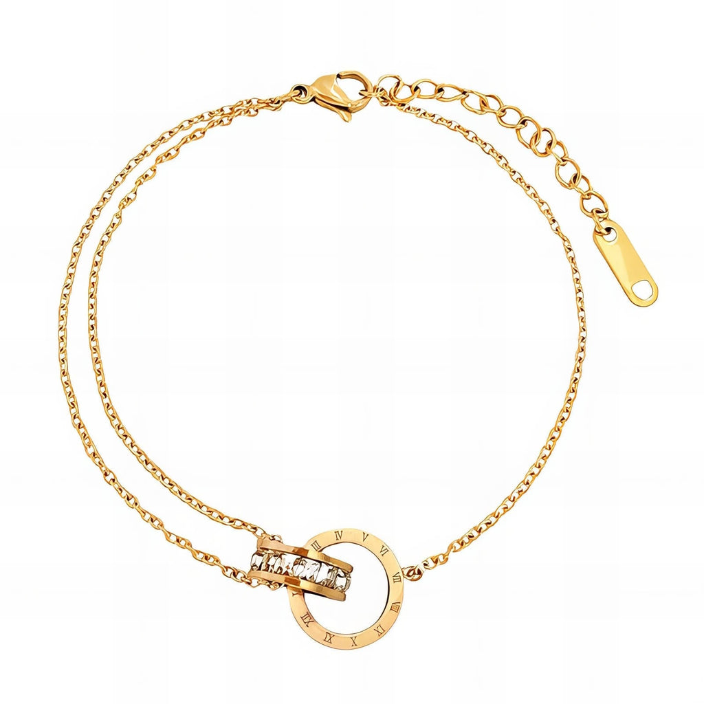Waterproof gold anklet with dual chain design and Roman numeral charm, adjustable 20 + 5 cm for daily elegance and hypoallergenic wear.